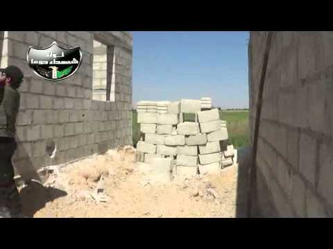 تجهيزات عسكرية يقوم بها لواء شهداء دوما استعداداً لإقتحام نادي الفروسية قرب بلدة البحارية في ريف دمشق