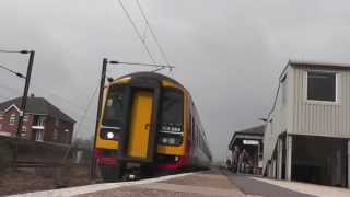 preview picture of video 'East Midlands Trains Class 156 864 arrives at Grantham - low angle view'