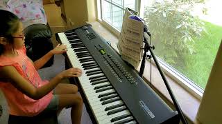 Ella playing &quot;Graduation&quot; by George Winston