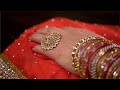 Close Shot Of Women Wedding Dress With Red Bangles And Golden Indian Stock Footage Knot9