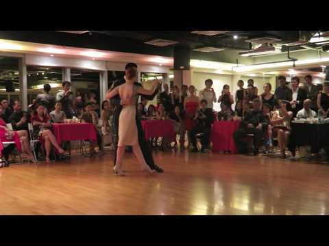  Sebastian Jimenez  and  Joana Gomes  are  dancing  to  a  tango