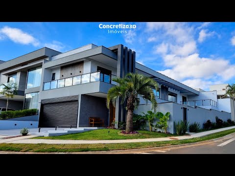 Viva com Elegância e Privacidade: Sobrado de esquina com 4 suítes, móveis planejados e piscina.