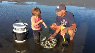 Baylor and Uncle Tim clamming at Sag Bay Maine