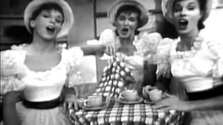 The McGuire Sisters play country girls in the City with a Paris medley.