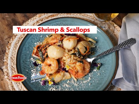 Tuscan inspired with this Shrimp and Scallops over Pasta on About the Dish!