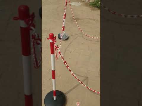 WARNING BOLLARD WITH SAND FILLED BASE