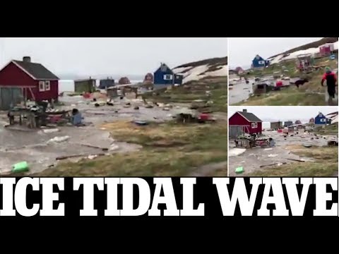 Terrifying video captures locals fleeing a tsunami in Greenland as waves carrying huge blocks