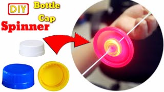 How to make spinning bottle caps / Spinner with bottle caps