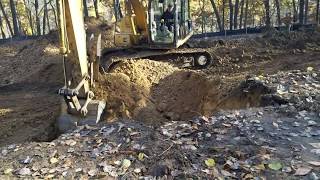 Prepping the Land: Basement Dug and Footings Poured
