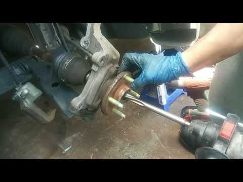 How to Remove An Outer CV Axle From A Wheel Hub