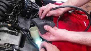 How to bleed a Ford Taurus power steering system for whine and fluid aeration
