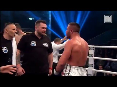 Opposition trainer shocks boxer with sneaky left hook!