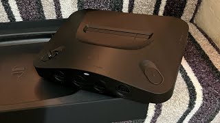 Analogue 3D is in the games room and unboxing. 