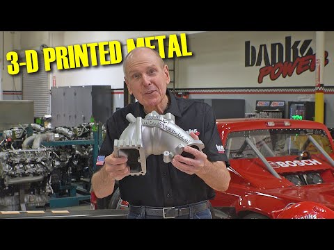 This is a 3-D printed ALUMINUM Cummins intake!