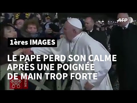 Le pape réagit avec irritation à une poignée de main trop énergique d'une fidèle | AFP Images