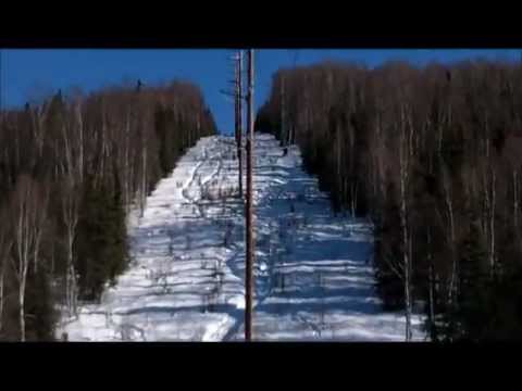 09 FX Nytro MTX 153 with MBRP can cruising up a power line trail (loud exhaust)