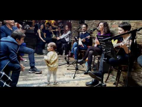 One year old girl dancing her first Zeibekiko to live music