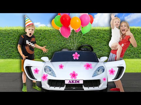 Amelia and Akim 7 year ride-on car birthday party, Avelina buys flowers.