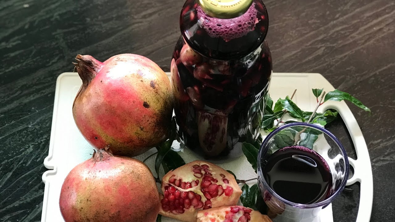 GARRAFADA DE ROMÃ E SUCO DE UVA