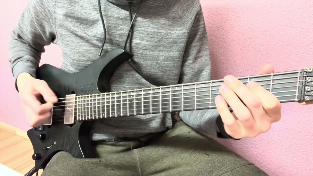 Roberto Barlocci playing the heavy 7/8 bridge riff from Haken's In Memoriam on electric guitar