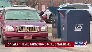 Sneaky thieves targeting big blue mailboxes