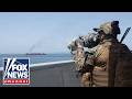 US Shoots HELLFIRE MISSILES At Ship Trying To Breach Iran Blockade