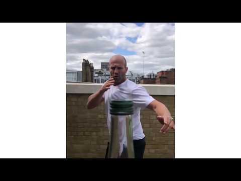 Jason Statham removes a bottle cap