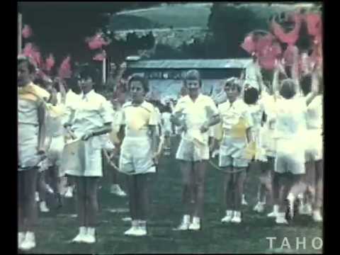 Cover image for Film - Apple Festival - annual apple festival at Cygnet in 1958 opened by Betty Cuthbert features Stockton Marching Girls team from NSW - Huon school children display - crowning Apple Queen 1957 - grand parade with decorated floats