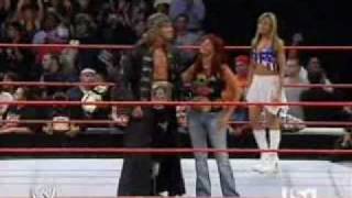 Edge WWE champion with Lita Womens champion entran