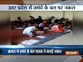 Madhya Pradesh: Policeman caught on camera helping students cheat in Board Exam