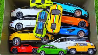 Box Full of Model Cars -Mazda Mx5, Koenigesgg Jesko, Lamborghini Scv12, Byd Yang Wang U8, Toyota Car