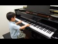 4 year old plays RCM Grade 7 piano Bach.