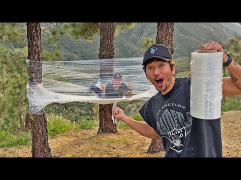 Building a PLASTIC WRAP Survival TENT (BAD IDEA)