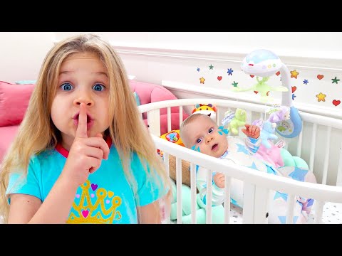 Diana ayuda al bebé Oliver a dormir