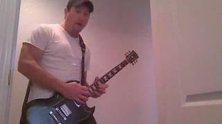 Me in a Doorway with my Gigson SG guitar on my Frenzel 5E3 amp