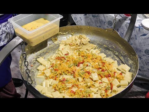 Pepper Street Food Festival Seen in italy. Huge Pepper Pasta Cooked on the Road