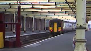 a Train Departs Kilmarnock  for Glasgow