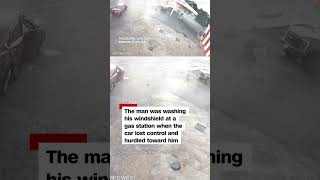 Security camera footage captured a man dodging an out-of-control car at a gas station in Nebraska.