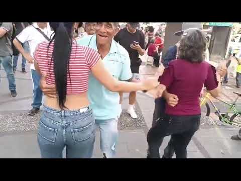 Beautiful mountain girl from San Luis dances in Berrio Park, Rubiela song