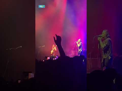 Brandon Boyd introduces Incubus' new bassist, Nicole Row, at the band's concert in Manila
