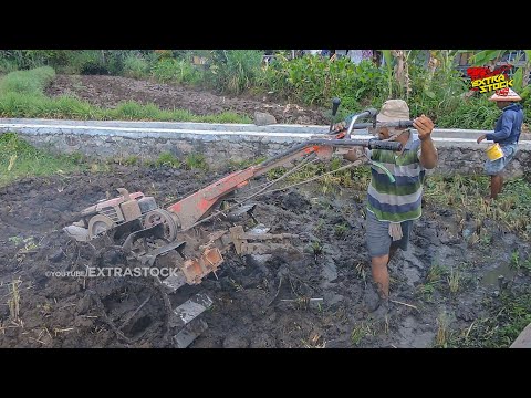 Spinning Hand Tractor Struggles Hard Til Waterless Land