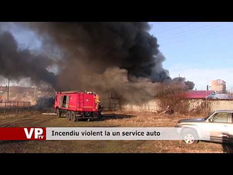 Incendiu violent la un service auto