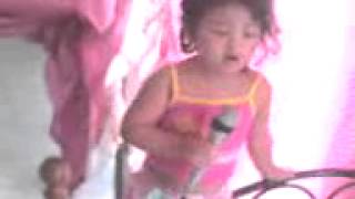 Gabi is singing what makes you beautiful (Real name Gabriella Anne Flores)