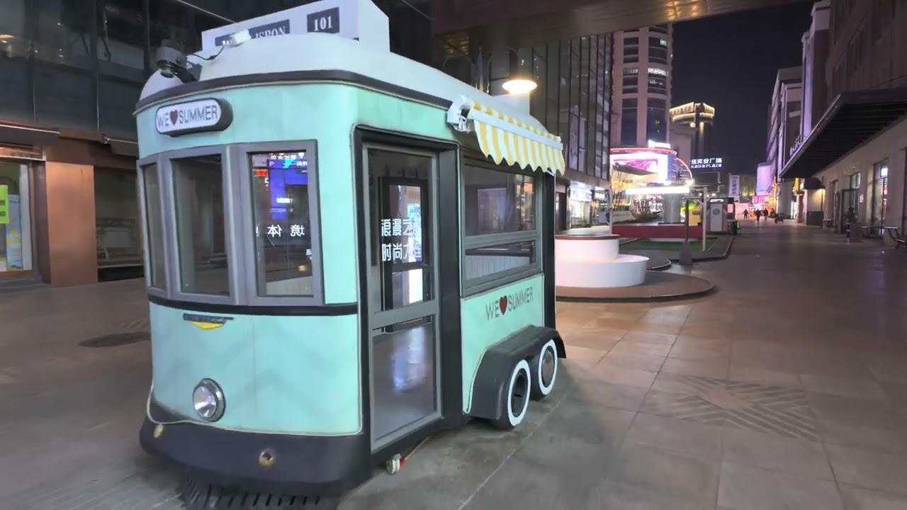 Immersive street-level walking tour through Dalian Zhongshan Square, China, showcasing authentic urban landscapes, local architecture, and the vibrant atmosphere of the city's neighborhoods