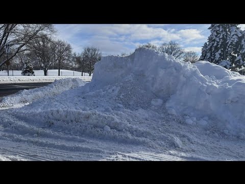 Crews working to clear dangerous snow piles across Twin Cities