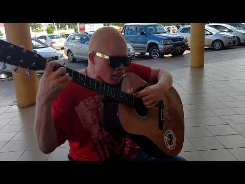Lazarus Chigwandali - Albino Musician in Malawi