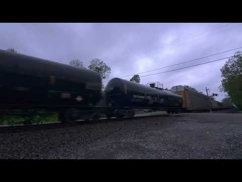 NS 4910 & 4415 clear Bill Jones Rd with a southbound mixed freight