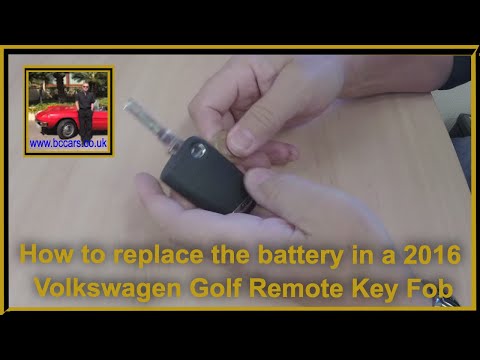 Part of a video titled How to replace the battery in a 2016 Volkswagen Golf Remote Key Fob