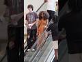 TOUCHING RANDOM STRANGERS ON THE ESCALATOR