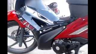 Red Honda Wave 125 alpha with Gilas Stiker